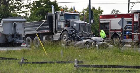 Fatal collision involving a dump truck .